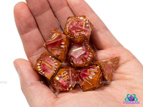 Mimic's Bite | Pink & Red, Transparent, Gold, Sharp-Edged, Mimic Teeth and Mouth | Resin Dice Set (7)