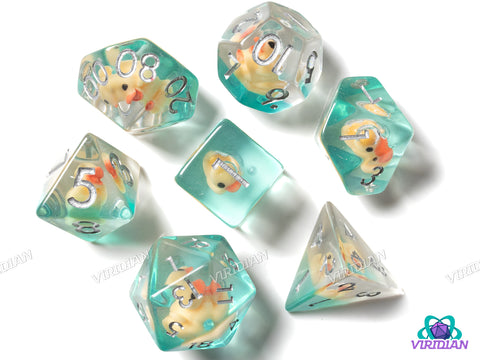 Yellow Duck, Teal Lake | Translucent, Clear, Green & Yellow, Duck, Animal, Joke | Resin Polyhedral Dice (7)
