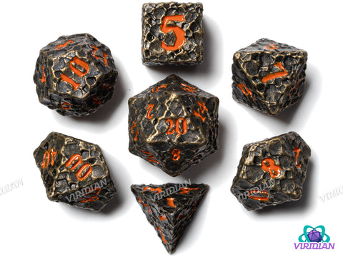 Forbidden World V2 | Cratered Design | Bronze, Brown Distressed Asteroid-Style, Red-Orange Ink | Metal Dice Set (7)