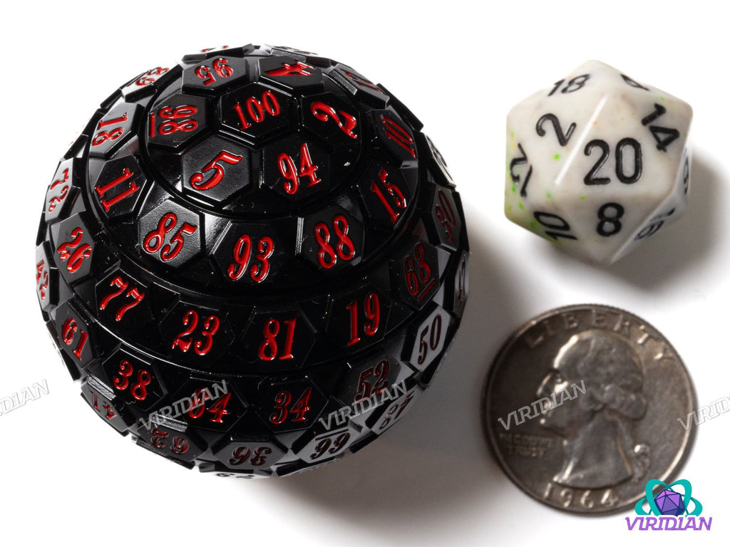 Black & Red D100 acrylic die with red numbers, shown next to a D20 die and a US quarter for size comparison. Giant 45mm single die in stock.
