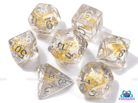 Golden Gears | Shiny Bright Yellow-Gold, Clear-Translucent | Resin Dice Set (7)
