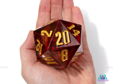 Phoenix Down | 55mm Red Giant Feather Filled Clear Resin D20 Die (1) | Viridian Exclusive