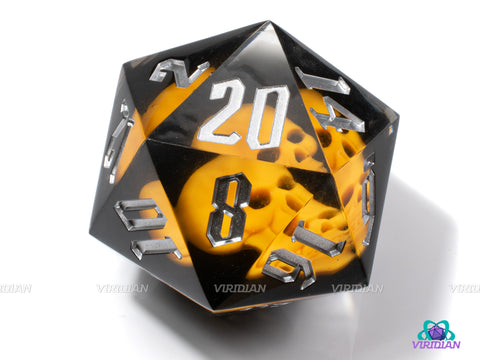 All Hallows Eve | 55mm Translucent Black Resin with Glow Yellow Skull Inside | D20 Die (1)