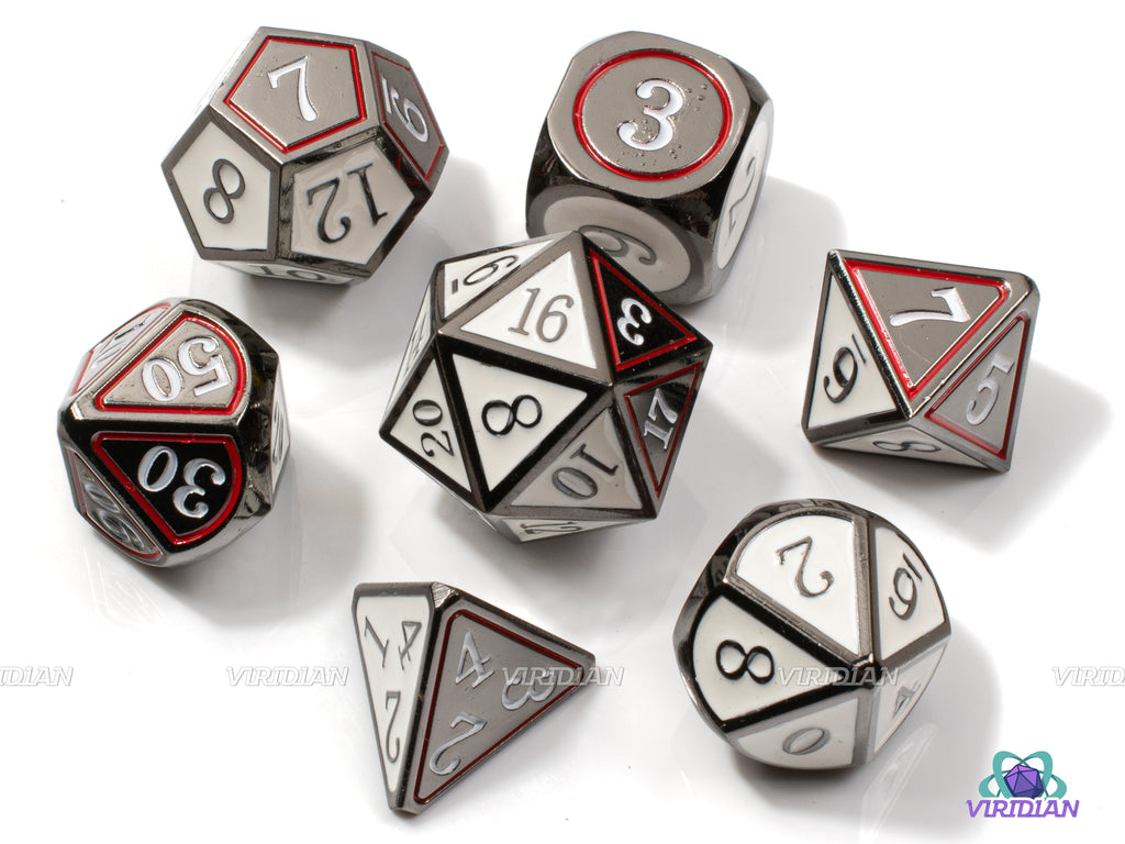Seven silver-colored polyhedral dice with black and white faces, red outlines and contrasting numbers.